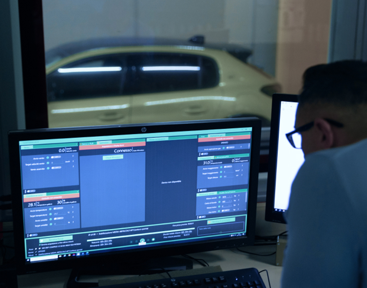 A man looking at a screen